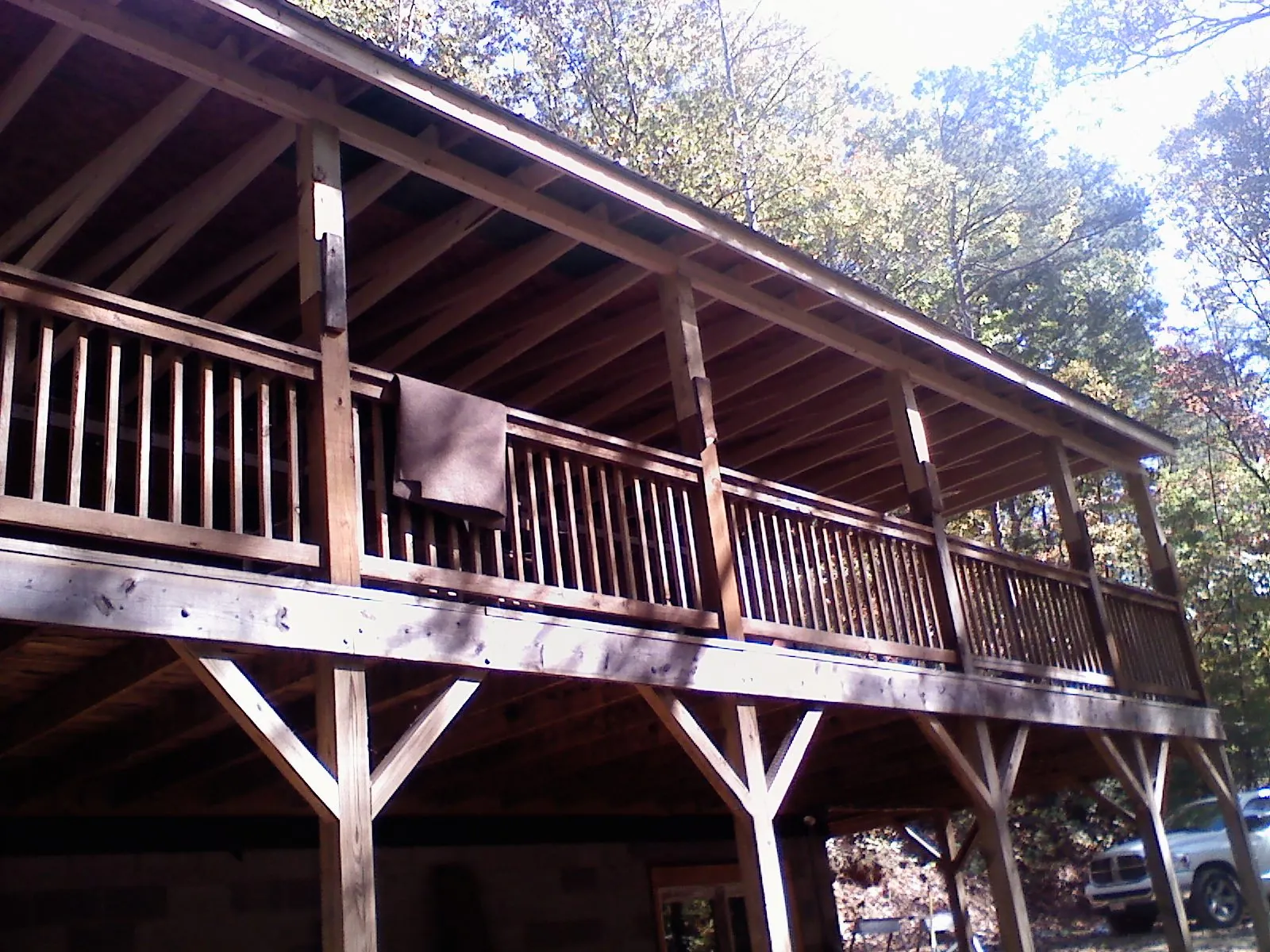 Timber framing under a new elevated porch and deck — Roof Leak Repair in Adel by Roofing Brothers